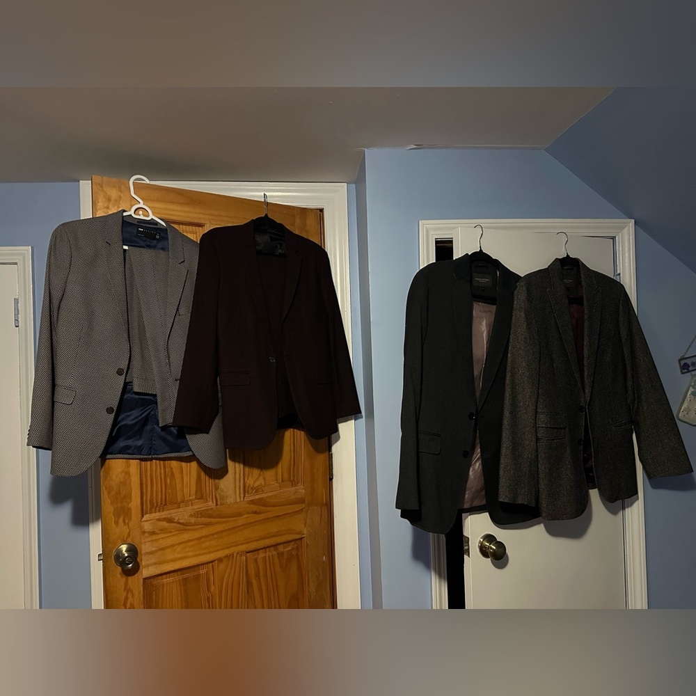 4 suit jackets, 2 matching suit pants. Size 38